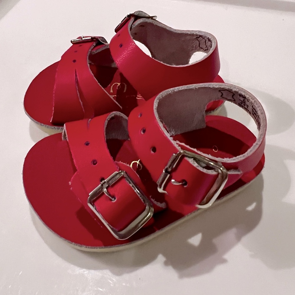 Size 0, red, sun San sea wee sandal.  brand new never worn.